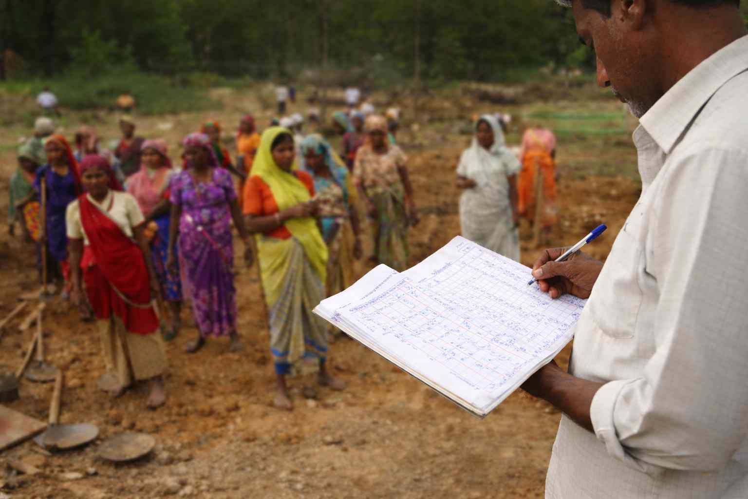 Attendance being recorded for workers at an NREGA worksite